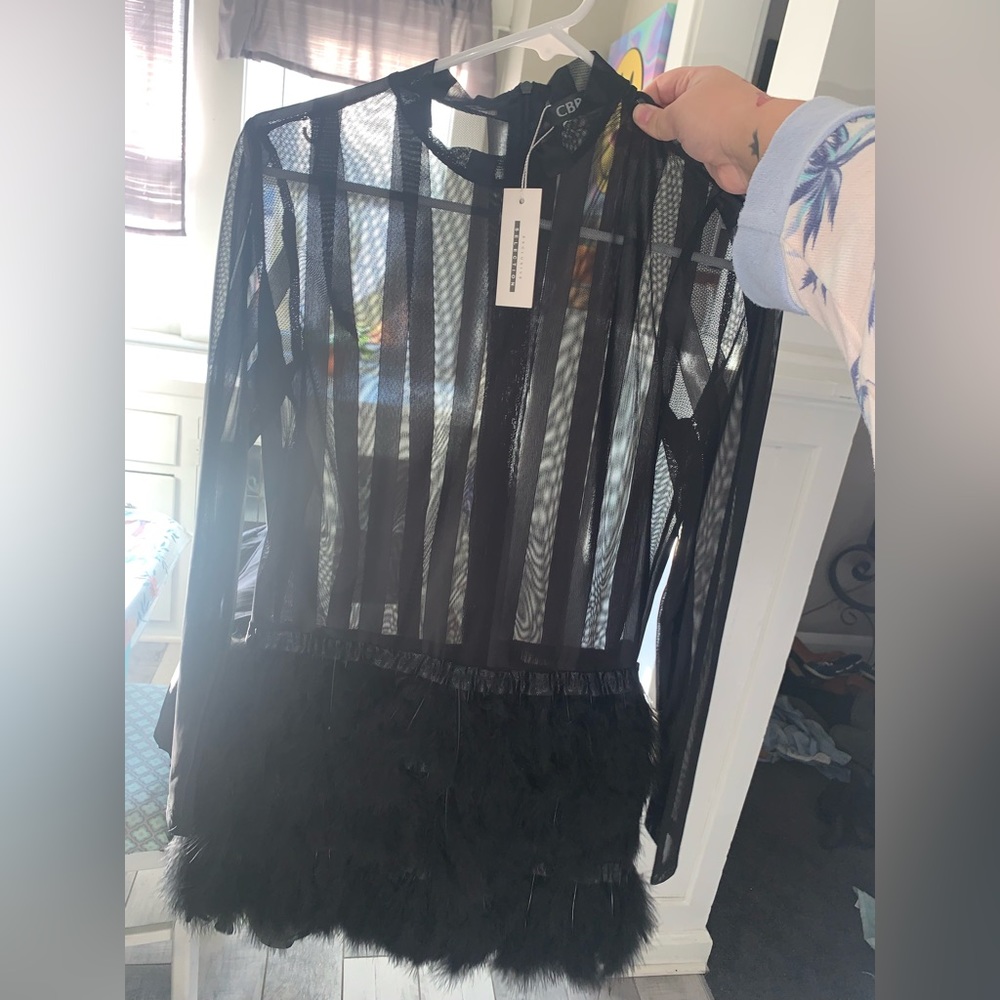 Black feathered dress